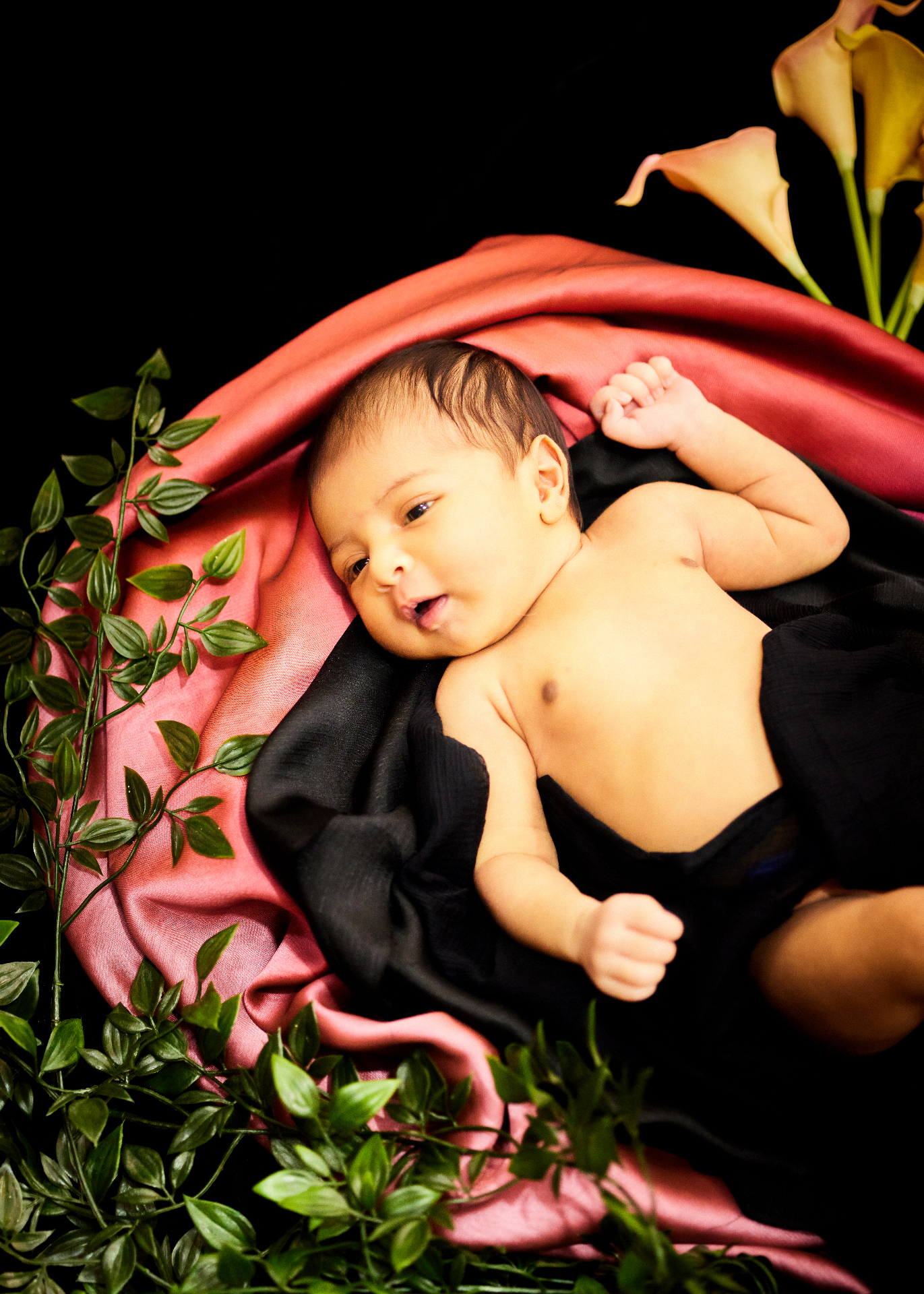 Newborn portrait with calla lilies